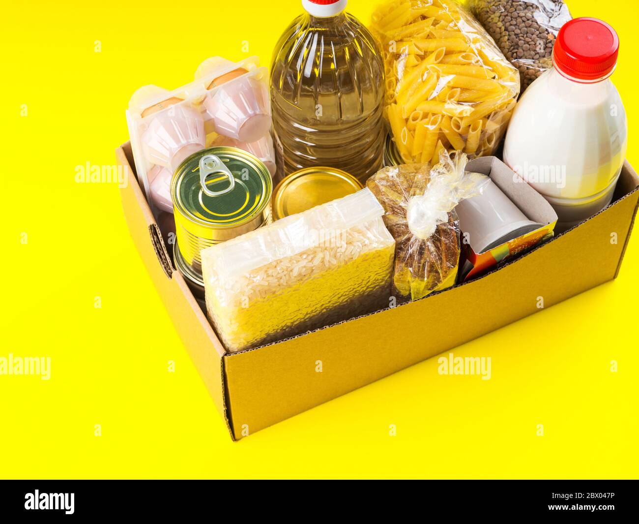 Food staples delivery or donation box concept Stock Photo Alamy
