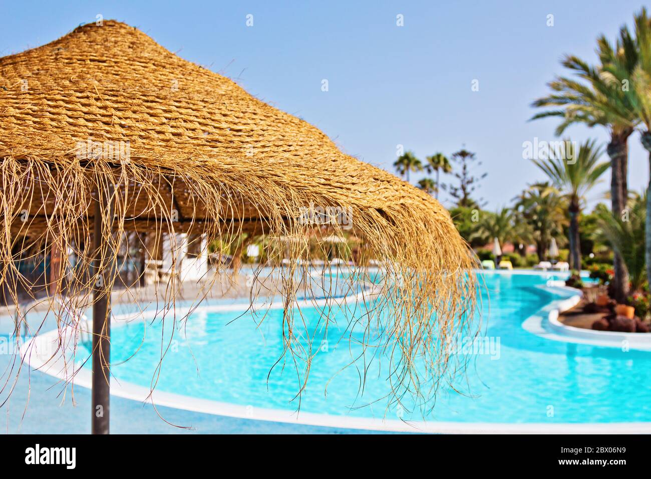 Parasol by the pool Stock Photo Alamy