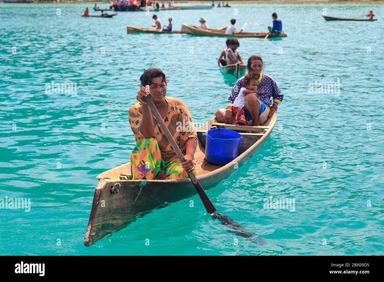 Semporna Sabah, Malaysia-CIRCA APRIL, 2017: Unidentified local BAJAU LAUT people on wooden boat in Bodgaya Island in Tun Sakaran marine park, Sabah Bo Stock Photo