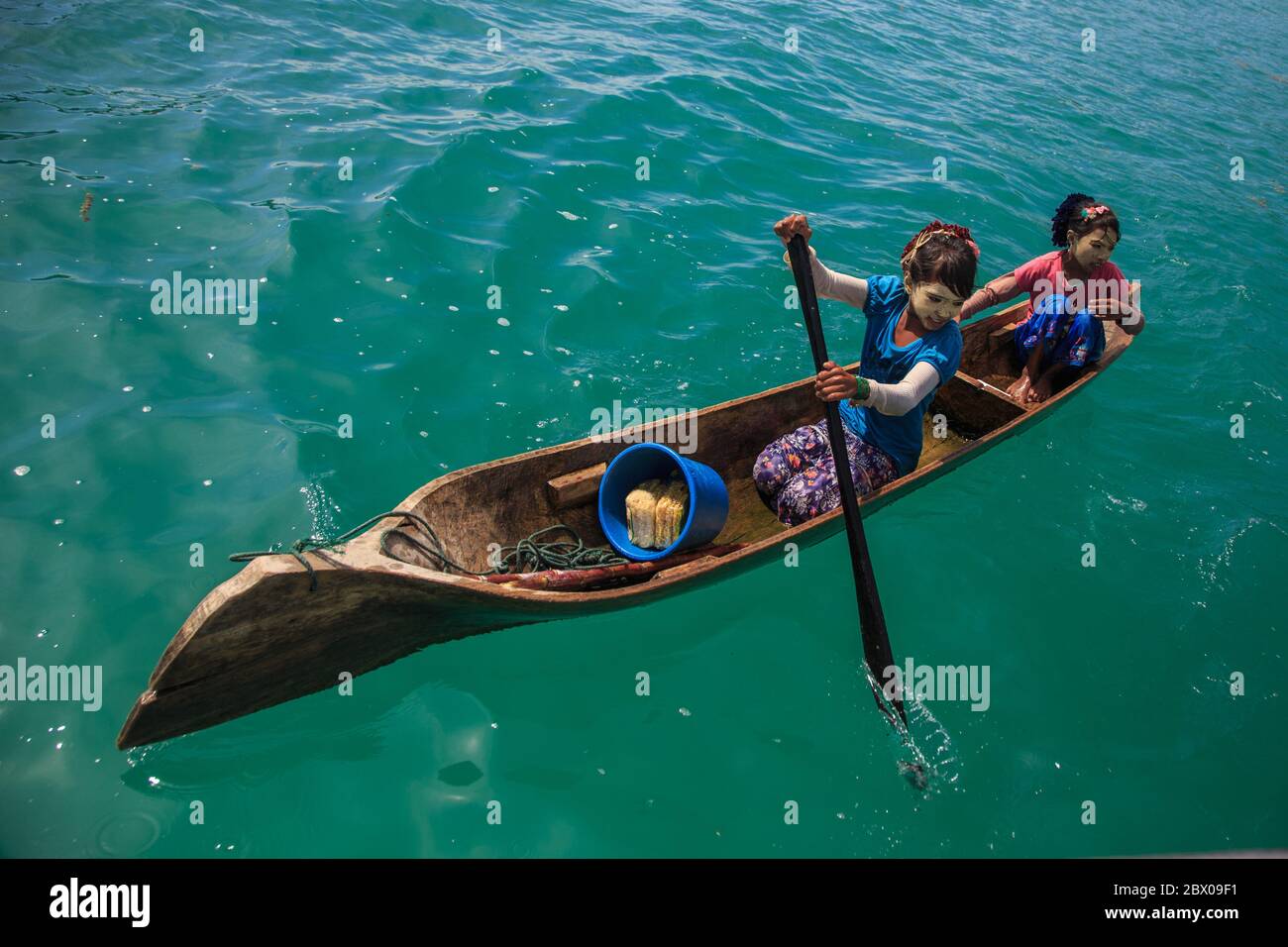 Semporna Sabah, Malaysia-CIRCA APRIL, 2017: Unidentified local BAJAU LAUT people on wooden boat in Bodgaya Island in Tun Sakaran marine park, Sabah Bo Stock Photo
