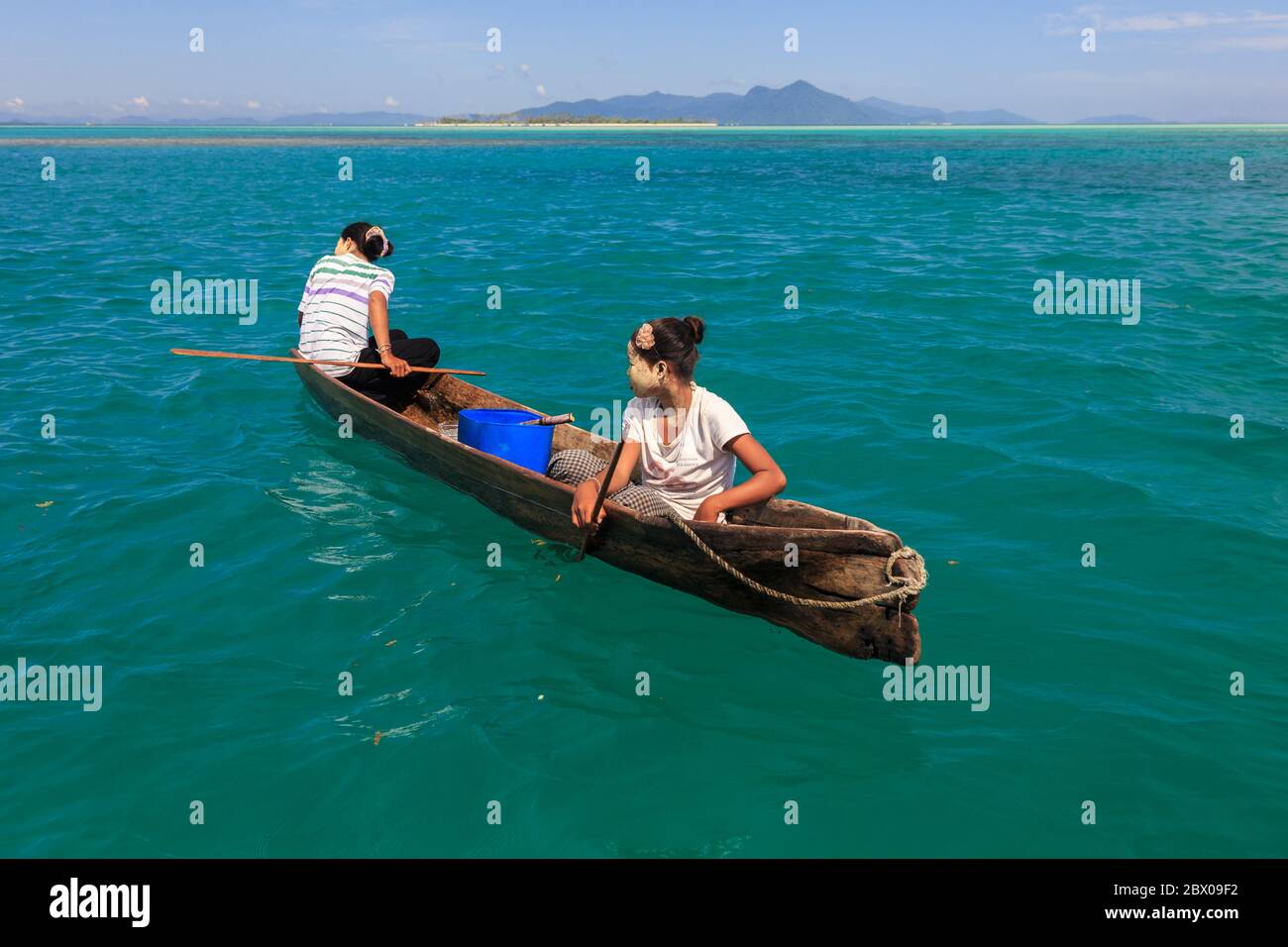 Semporna Sabah, Malaysia-CIRCA APRIL, 2017: Unidentified local BAJAU LAUT people on wooden boat in Bodgaya Island in Tun Sakaran marine park, Sabah Bo Stock Photo