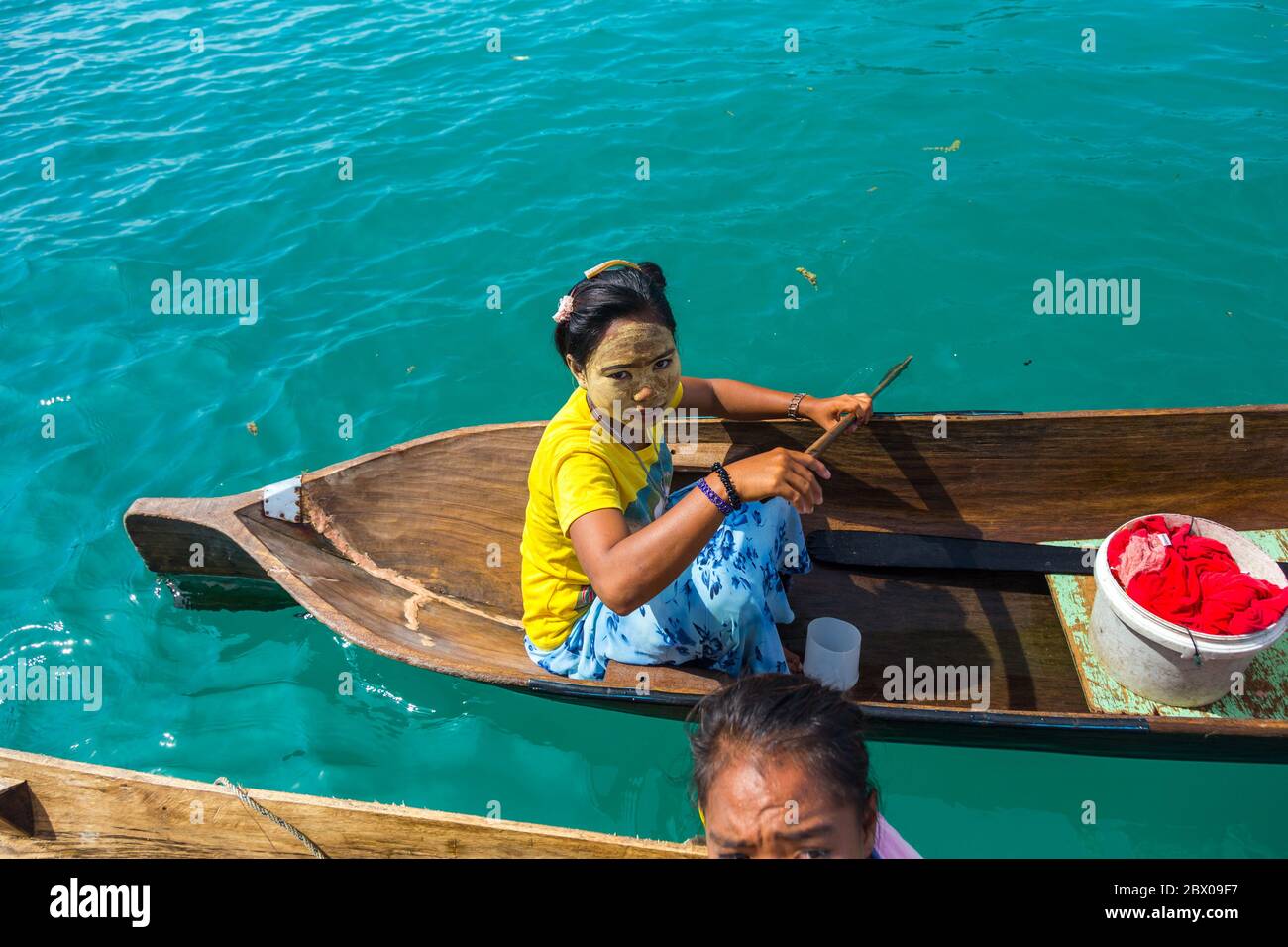 Semporna Sabah, Malaysia-CIRCA APRIL, 2017: Unidentified local BAJAU LAUT people on wooden boat in Bodgaya Island in Tun Sakaran marine park, Sabah Bo Stock Photo
