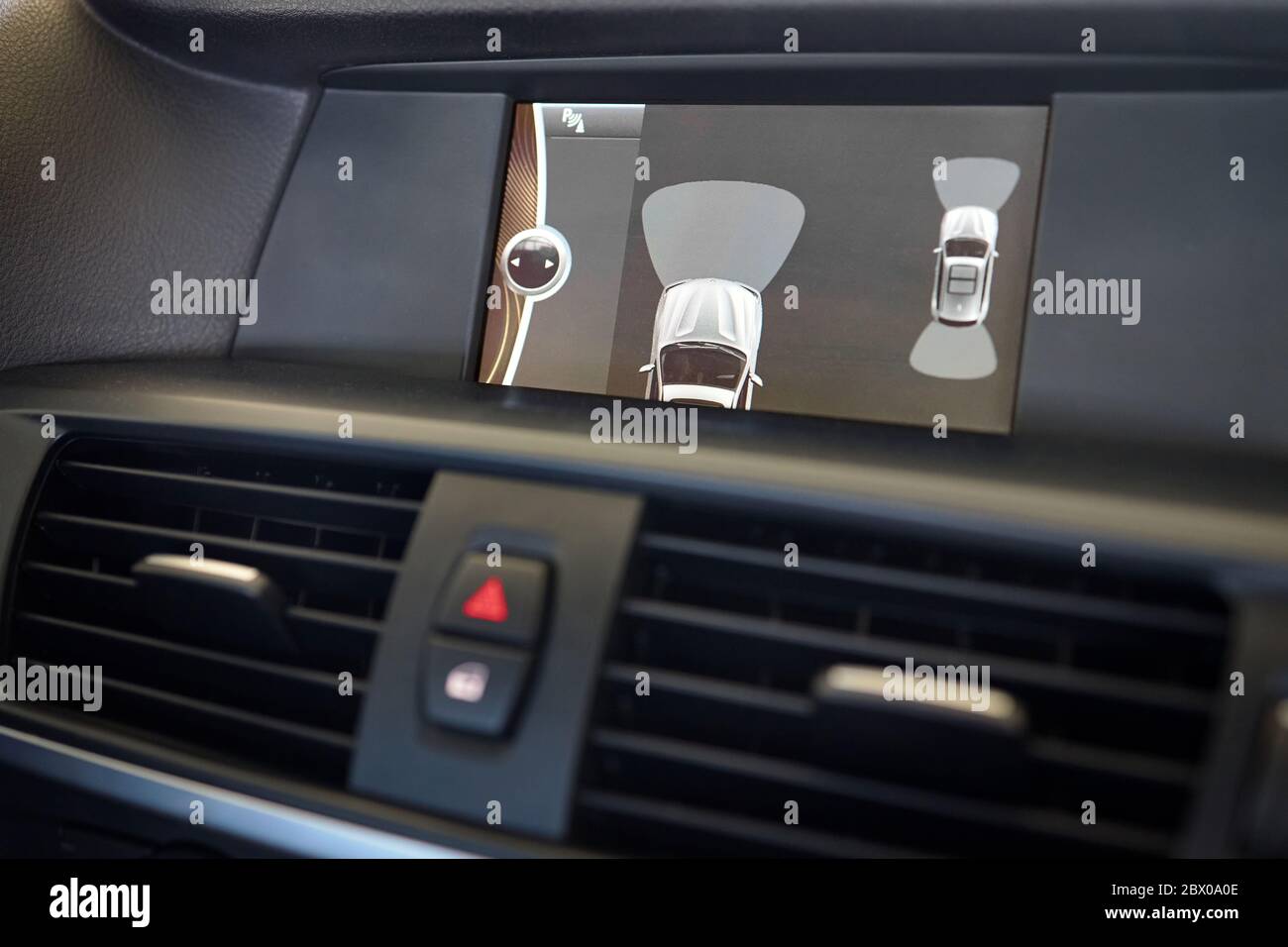 Interior of premium car backup parking assistant system with sensors on
