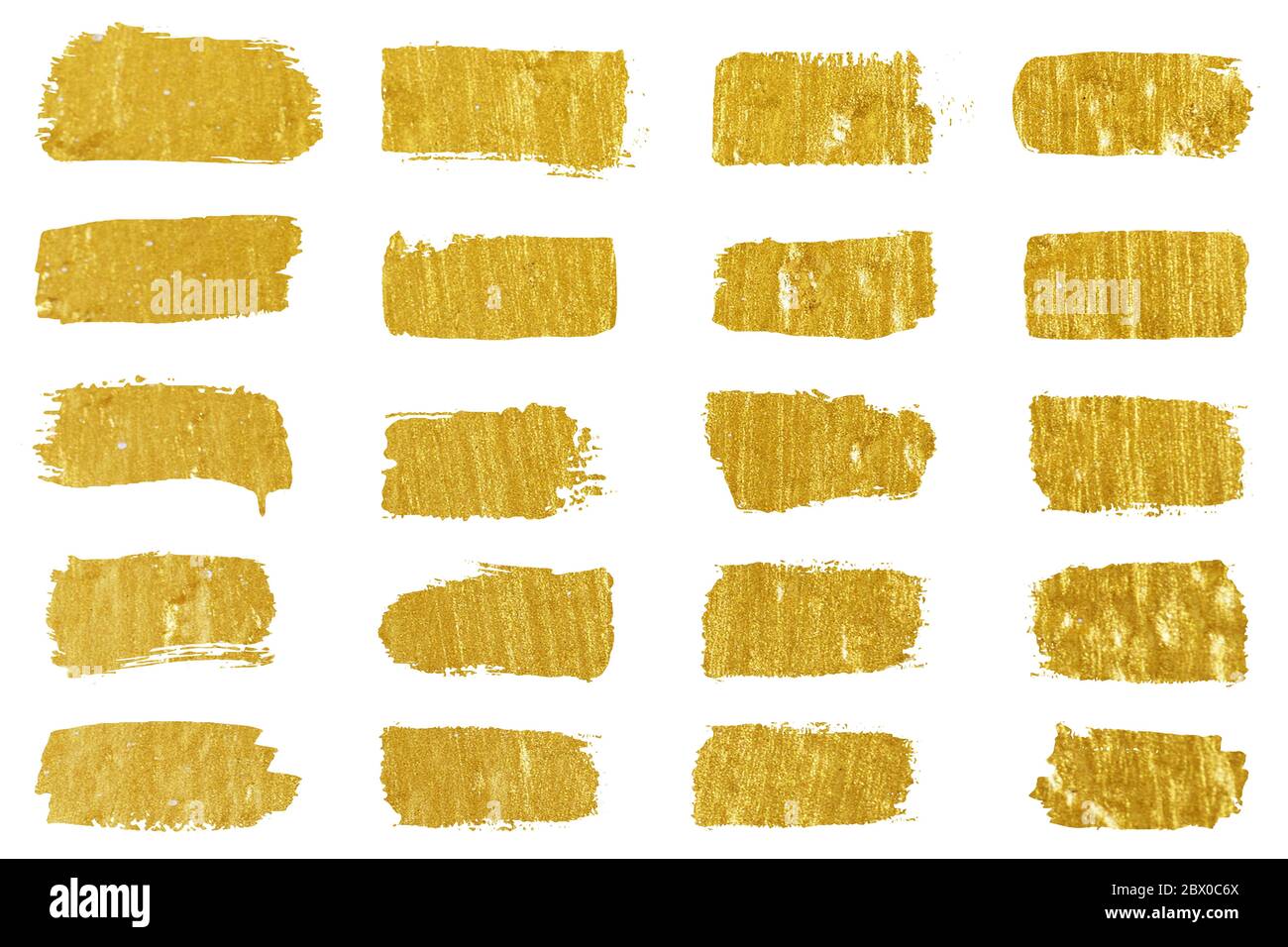 Collection of golden paint strokes. Grunge abstract hand painted element gold strokes with a brush. Stock Photo