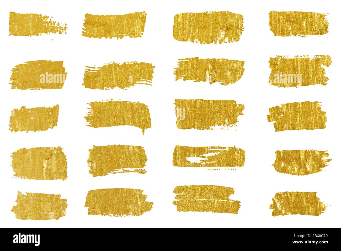 Collection of golden paint strokes. Grunge abstract hand painted element gold strokes with a brush. Stock Photo