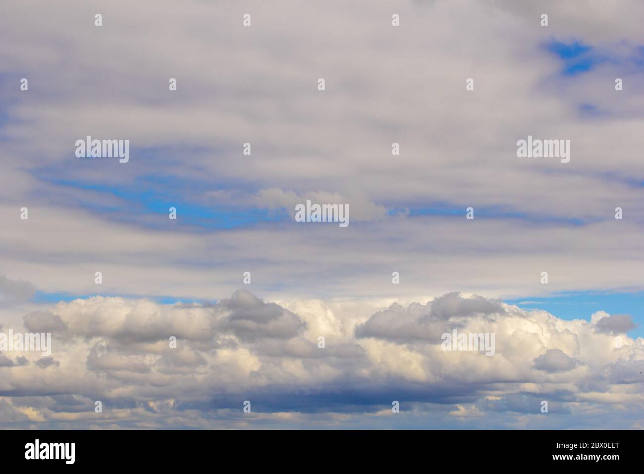 Light cumulus clouds in the blue sky Stock Photo - Alamy