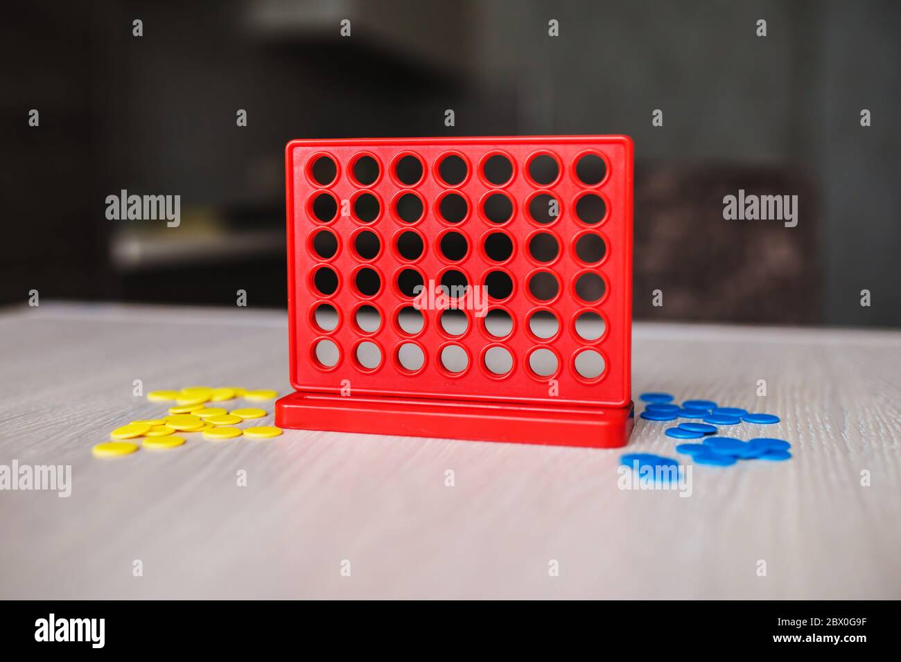 Intellectual board strategy game "four in a row" a game for the whole