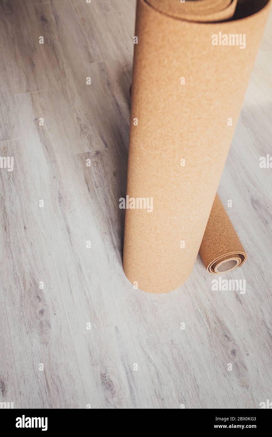 Cork underlay on a new laminate floor floor coverings Stock Photo Alamy