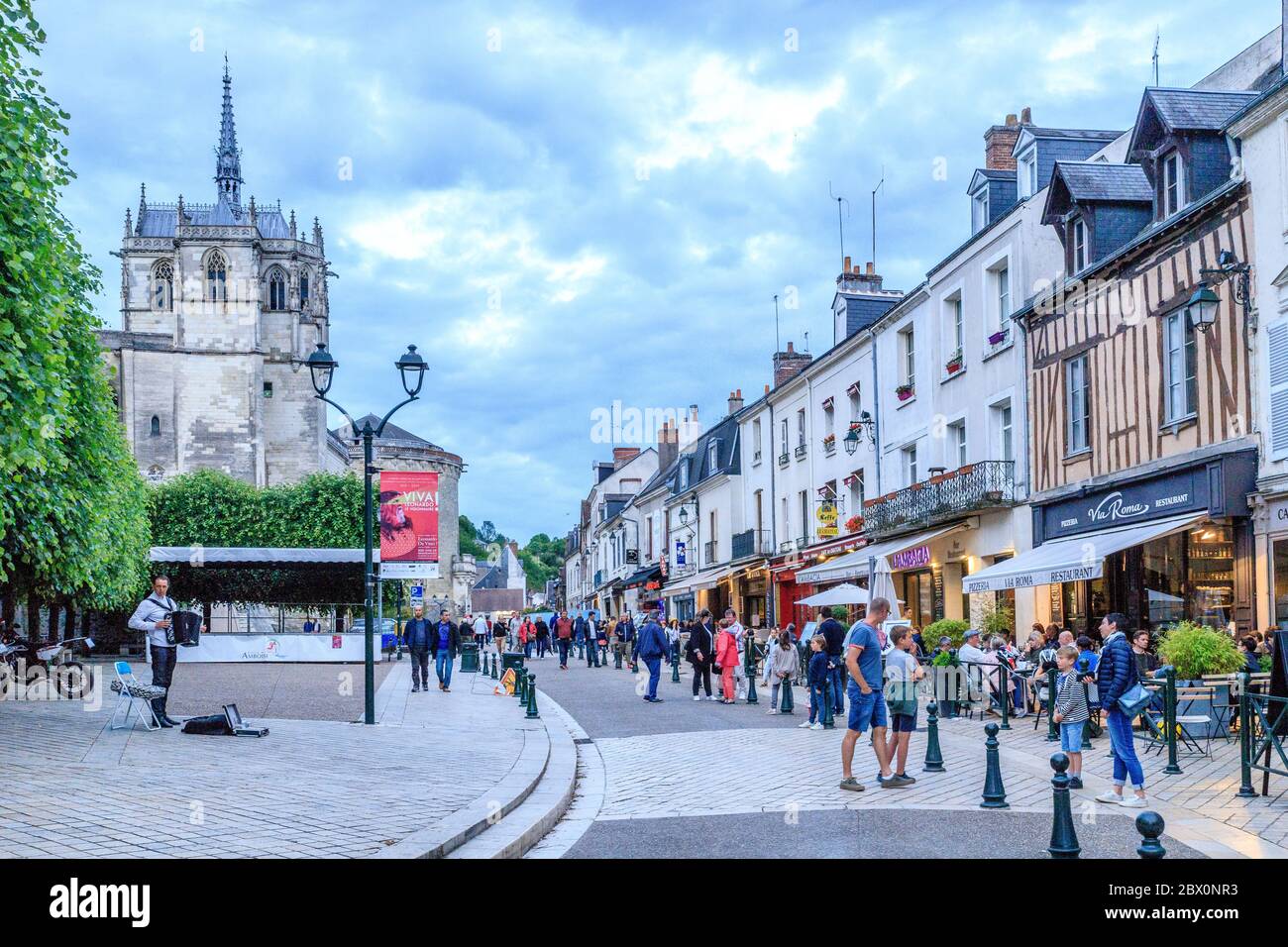 France, Indre et Loire, Loire Valley listed as World Heritage by UNESCO, Amboise, animated street in the city and Saint Hubert chapel where Leonardo d Stock Photo
