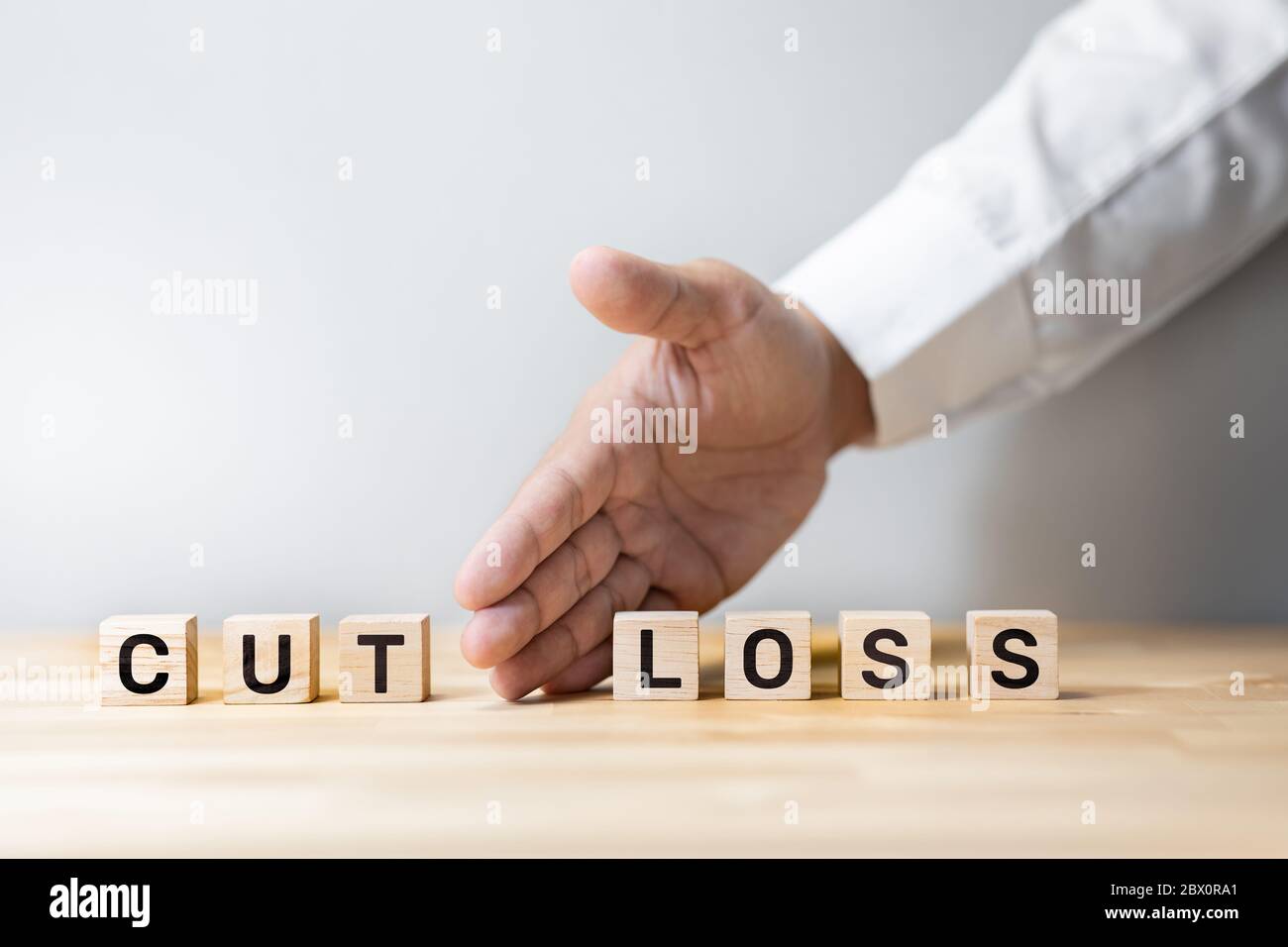 Investment strategic direction concepts with business person cut loss for saving money in stock market.financial management.challenge and change Stock Photo