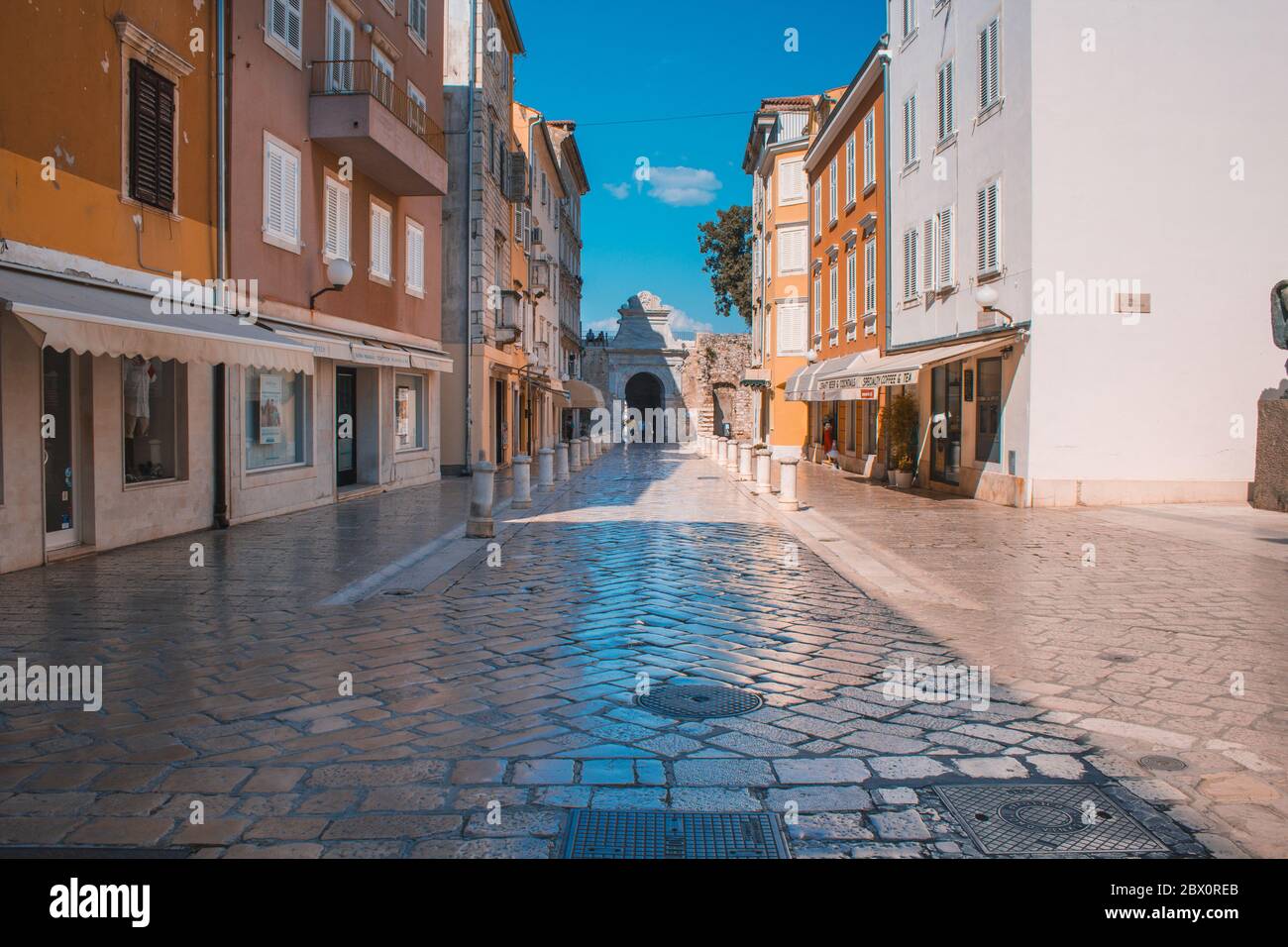 Zadar, Croatia - July 24 2018: Streets in the old town of Zadar. The famous  Sea Gate to the marina in the background Stock Photo - Alamy