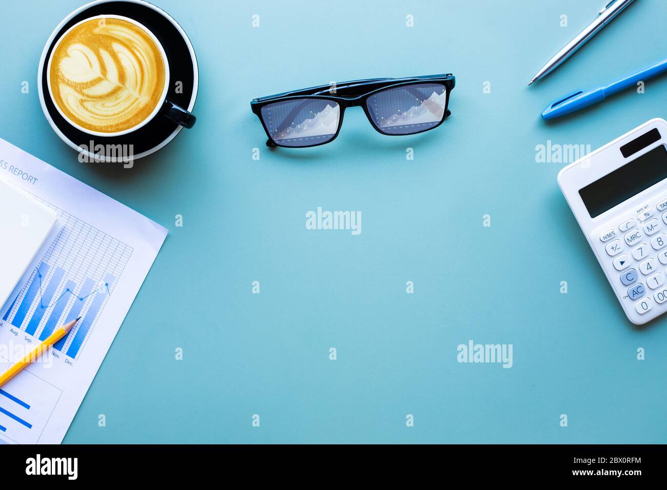 Planning and analysis strategy moment with graph growth in eyeglass and accessories.workplace and copyspace background. Stock Photo