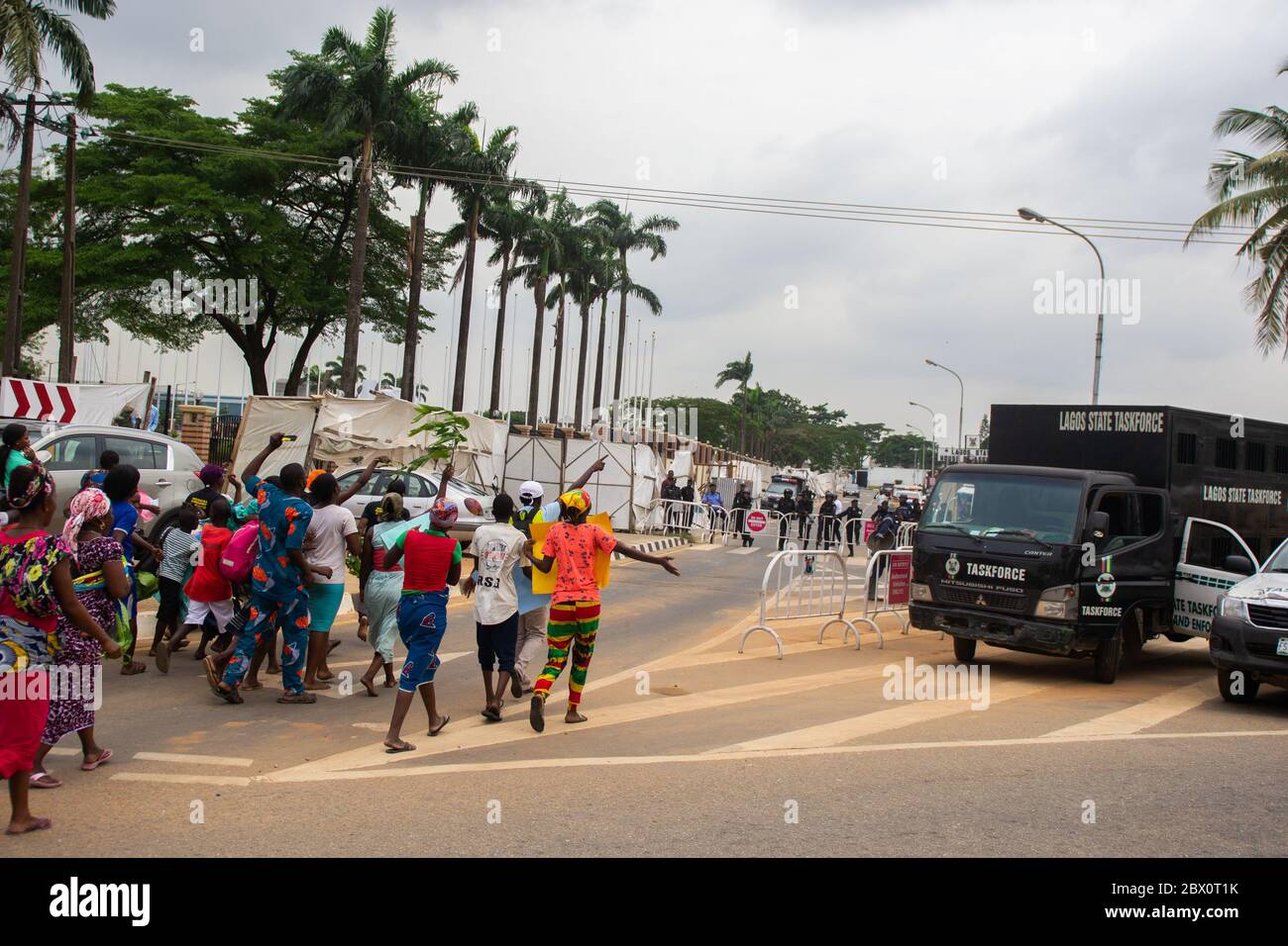 Lagos, Nigeria. Waterfront communities,members of the Nigerian Slum Federation joined by Amnesty International in a peaceful protest at the  Lagos State Government House.    More than 6 months after the court ruling, the state was yet to fulfill its promises and obey the court orders. Otodo Gbame and other waterfront communities staged a peaceful protest to the government house. The protest was billed to last for three nights and days, however, the Nigeria Police Force cracked down on the protesters by 12.28am on November 16 and arrested 158 protesters. They were later made to sign an undertak Stock Photo