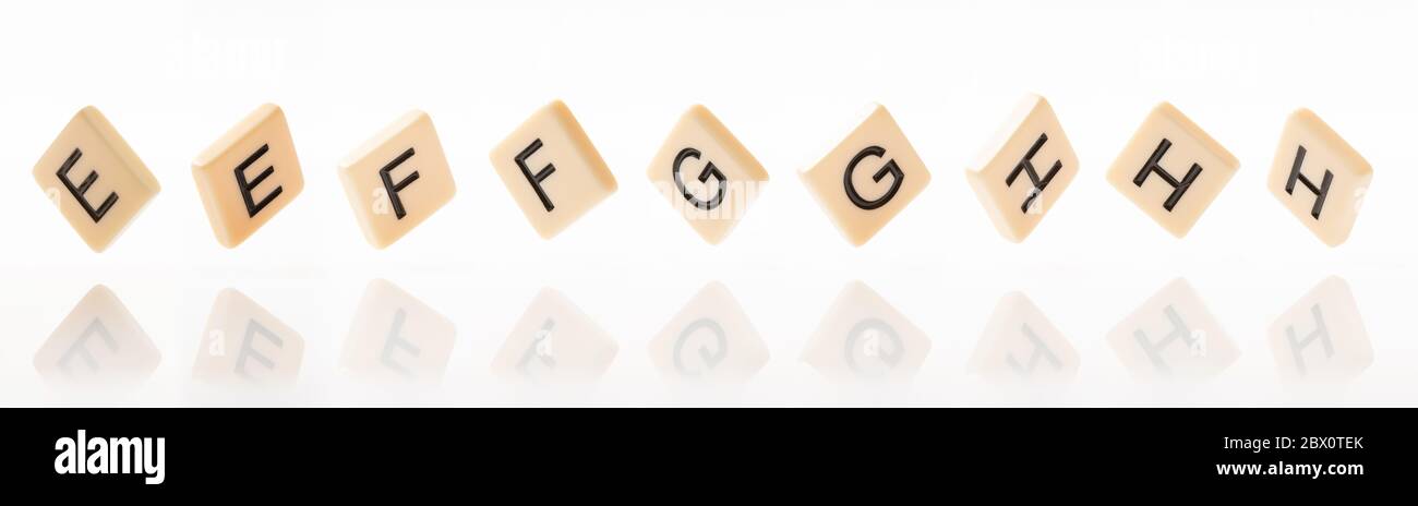 Alphabet E,F,G,H word block with white background. Stock Photo