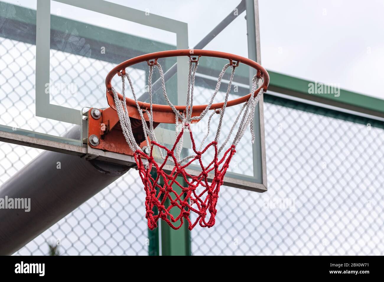 Basketball ring with a net for playing basketball outdoors Stock Photo