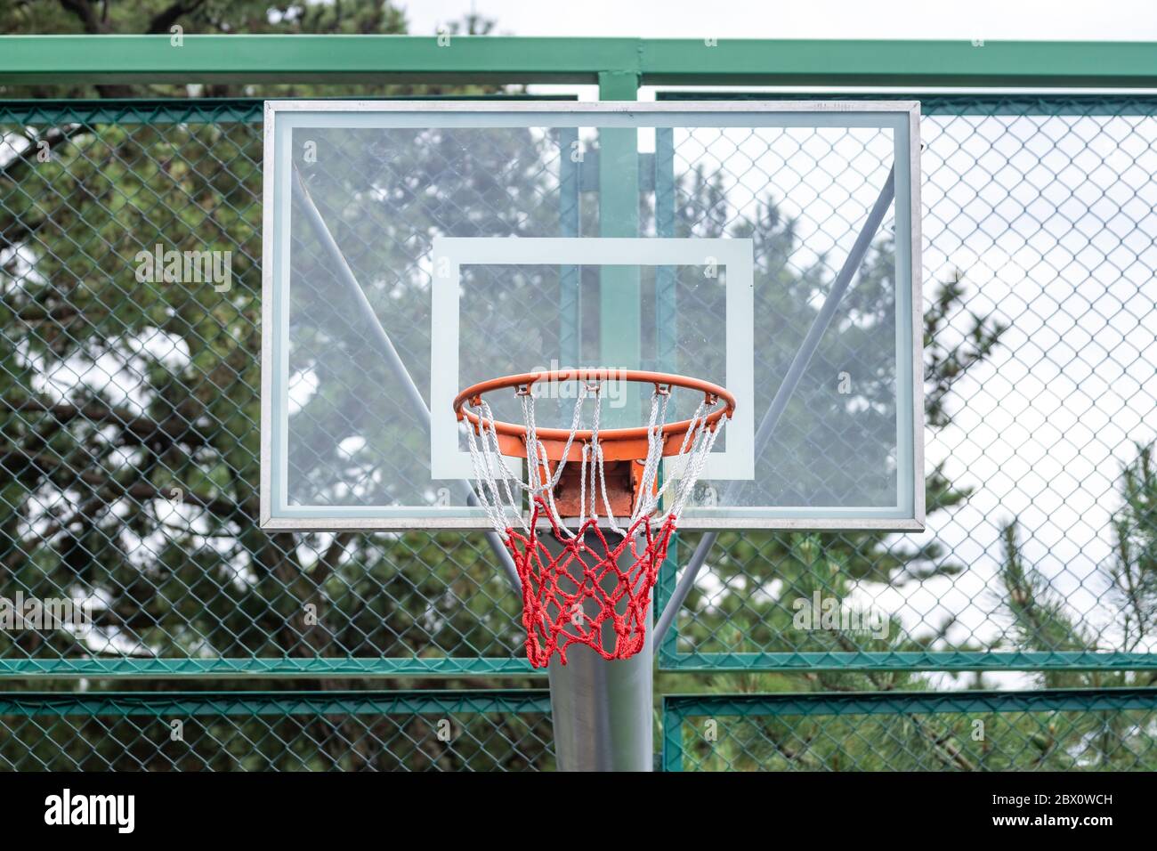 Basketball ring with a net for playing basketball outdoors Stock Photo