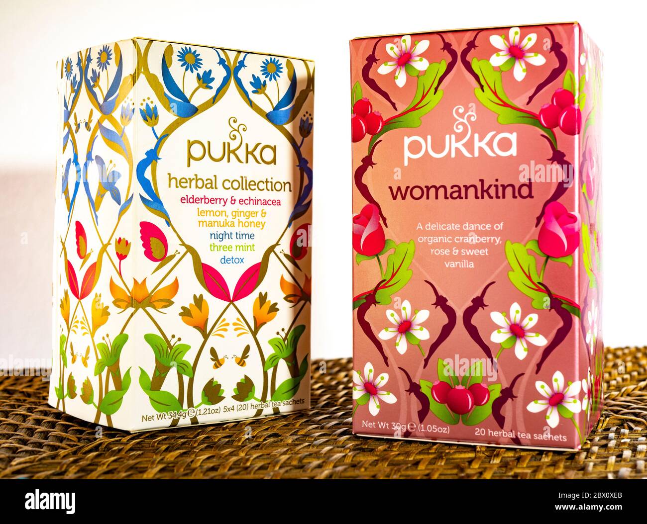 Two packets of Pukka herbal tea sachets – womankind and herbal collection.  Advertised as caffeine-free, ethically sourced and organically grown Stock  Photo - Alamy