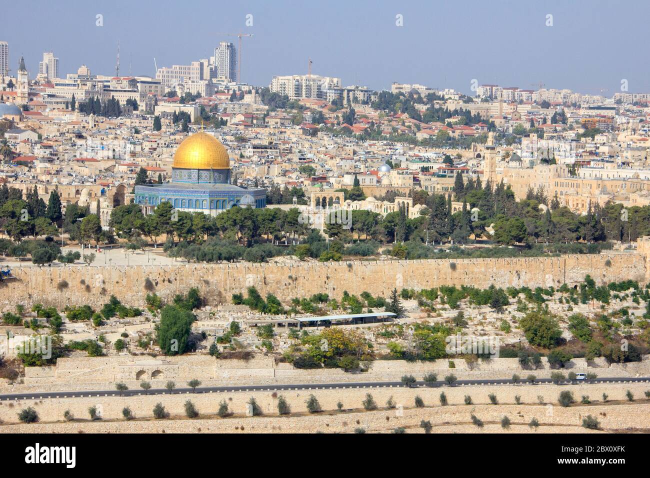 Still view of the mount of Olives and part of the city of Jerusalem with cars on the road near the Temple Mount Stock Photo