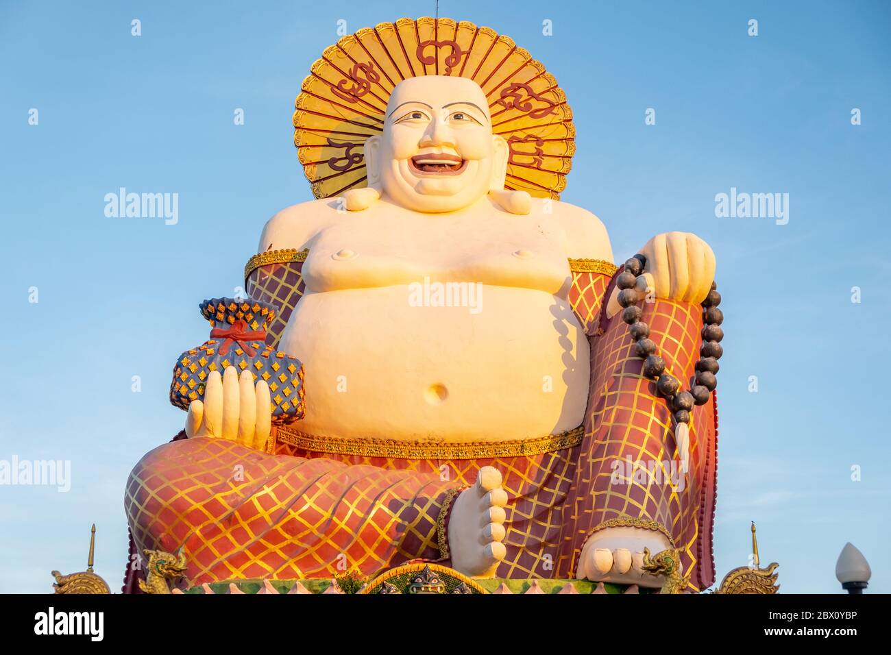 Budai or Pu-Tai or Happy Buddha or Laughing Big Buddha statue at Wat Plai Laem Temple in the Ko-Samui Stock Photo