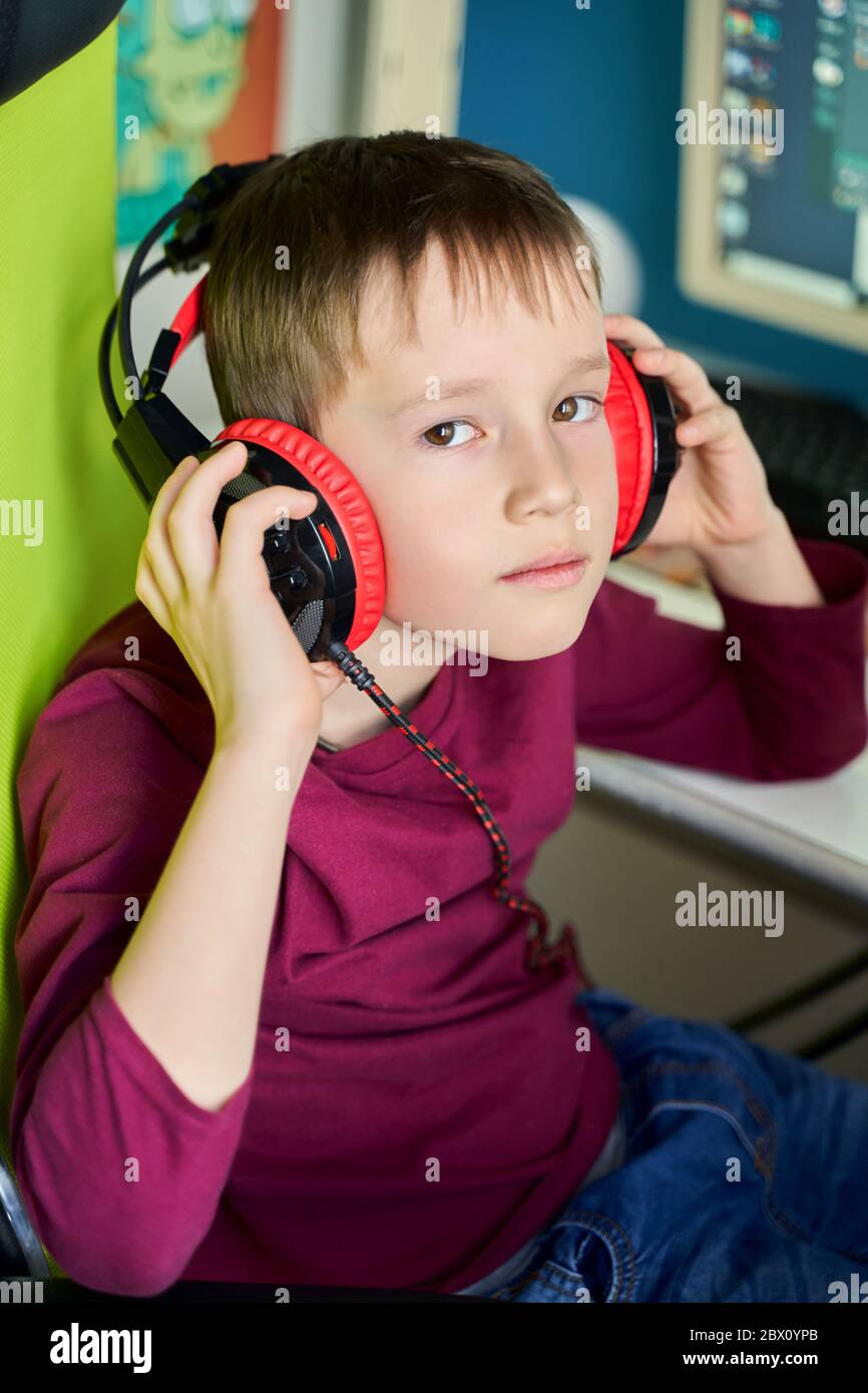 a student at home on distance learning. eyes full of sadness and incomprehension. students want to go to school Stock Photo