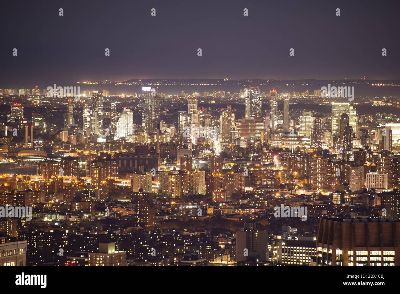Stunning view of the New York City skyline illuminated at night Stock ...