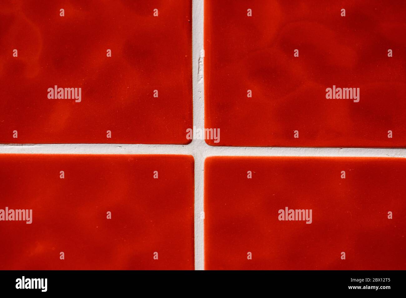 Contemporary Red Tile glossy mosaic Earthenware material Stock Photo
