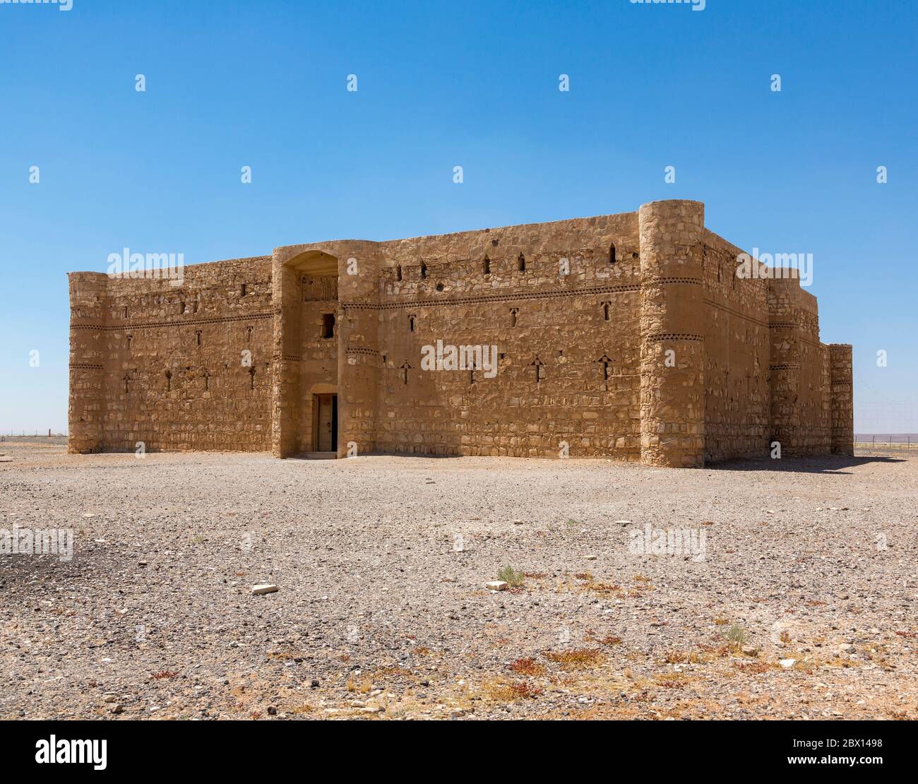 exterior with entrance, the early Islamic site of Qasr Kharana, Jordan Stock Photo
