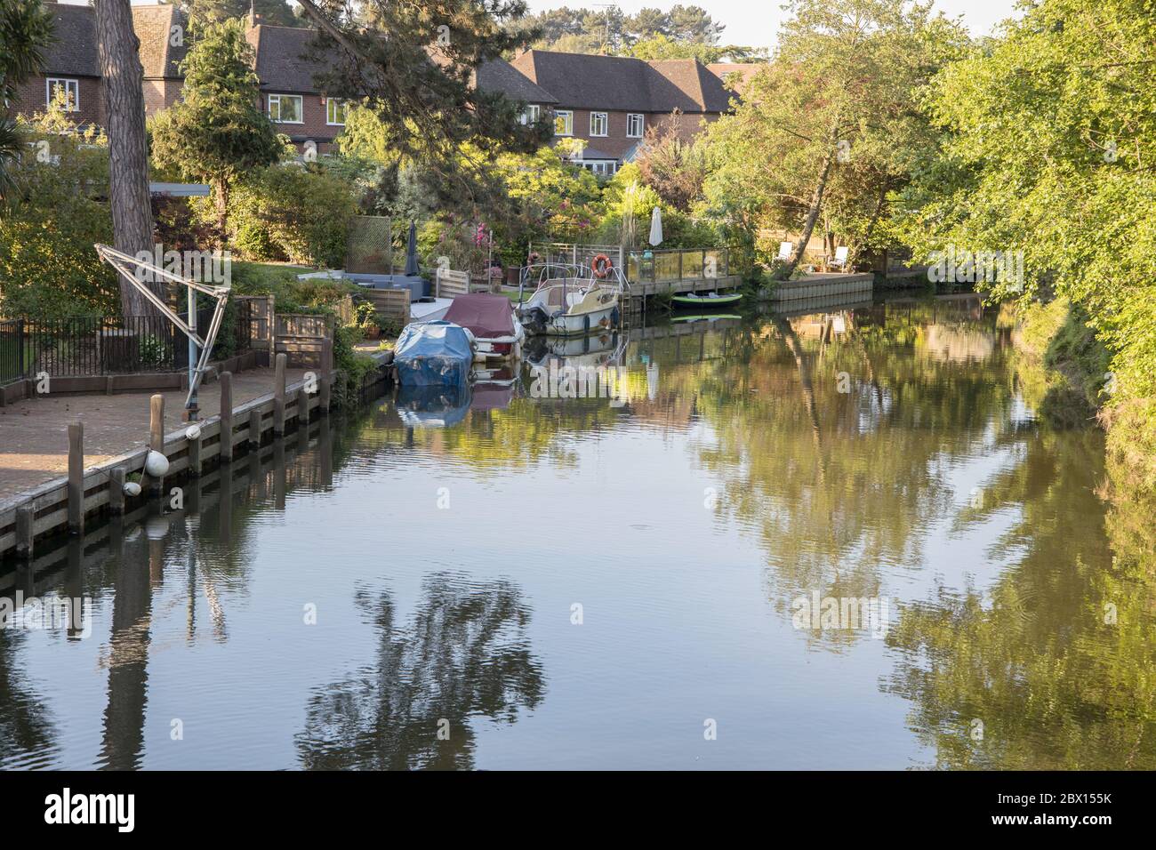homes on the banks of the the wey navigation at weybridge surrey Stock