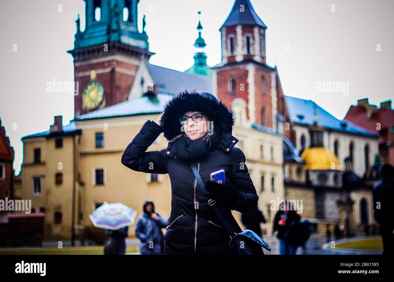 Woman walking down Royal Wawel Castle - Krakow - Poland - Europe Stock Photo