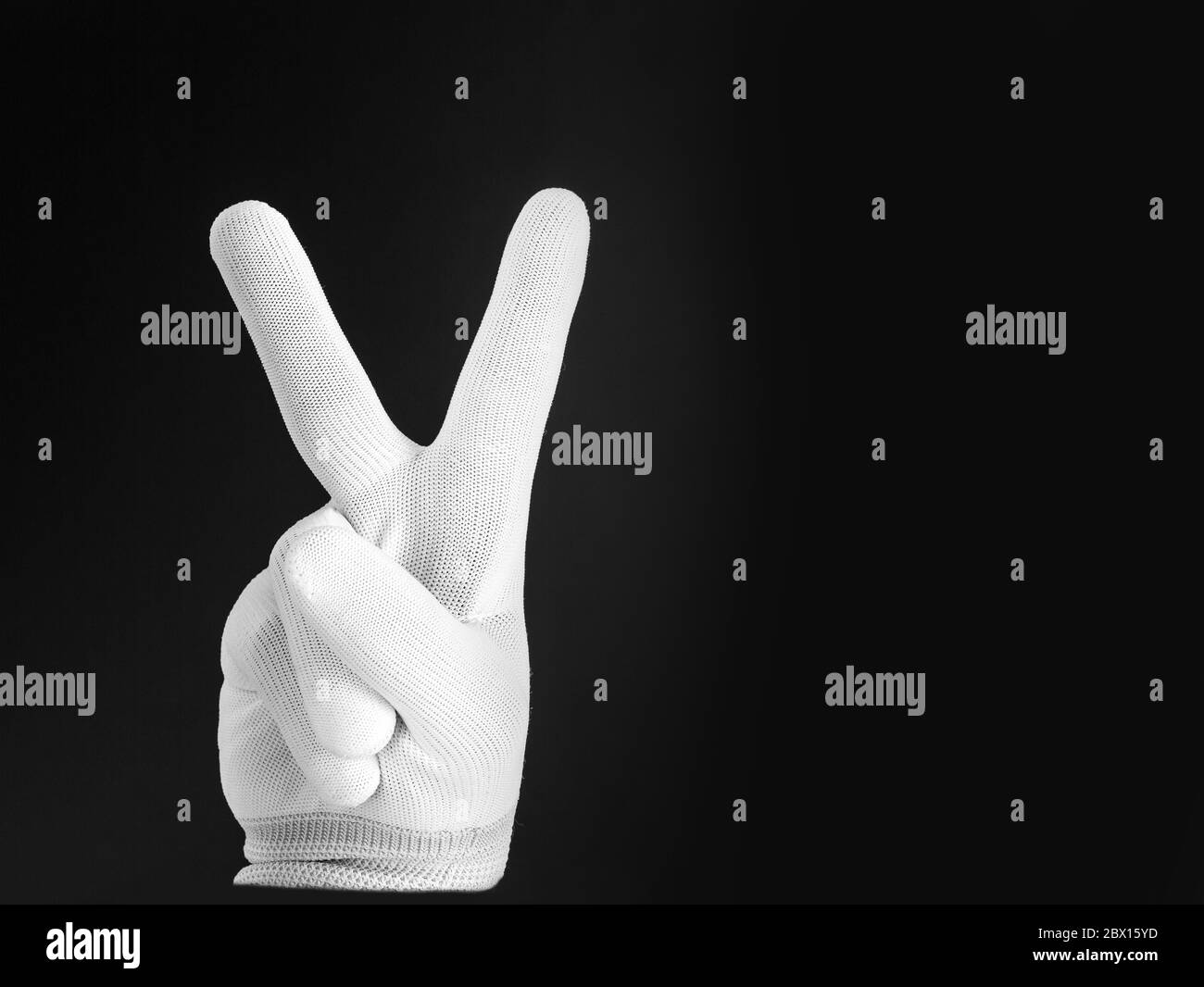 Man in suit white background sign Black and White Stock Photos & Images ...