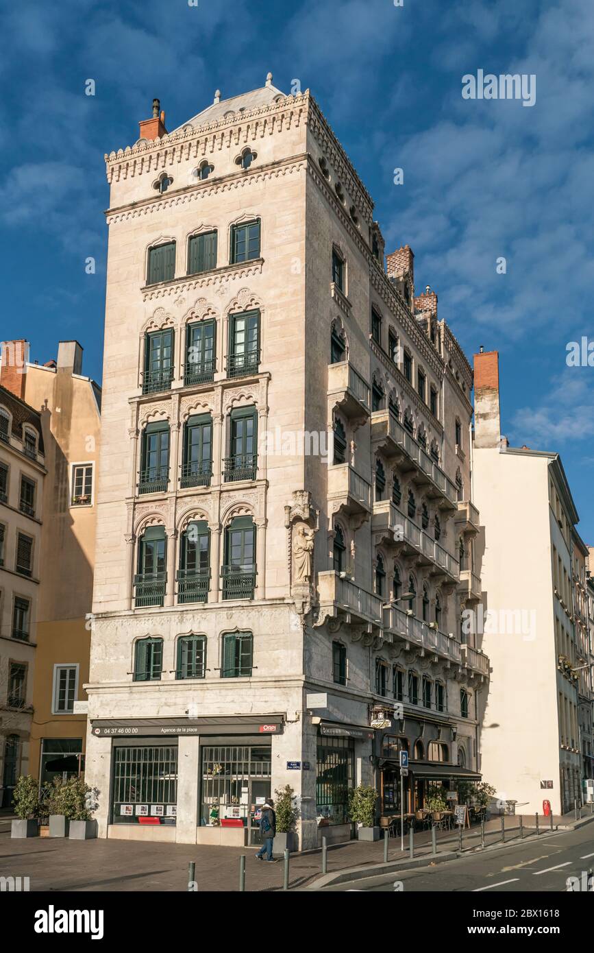 Lyon, France 3rd January 2020 - people passing an Authentic French building at the Quai Fulchiron in the old part of Lyon Stock Photo
