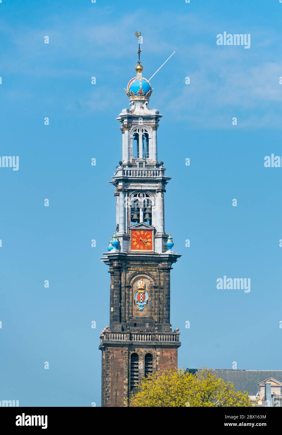 Amsterdam, april 9th, 2019 - Top part of the famous Westertoren (Western tower) Stock Photo