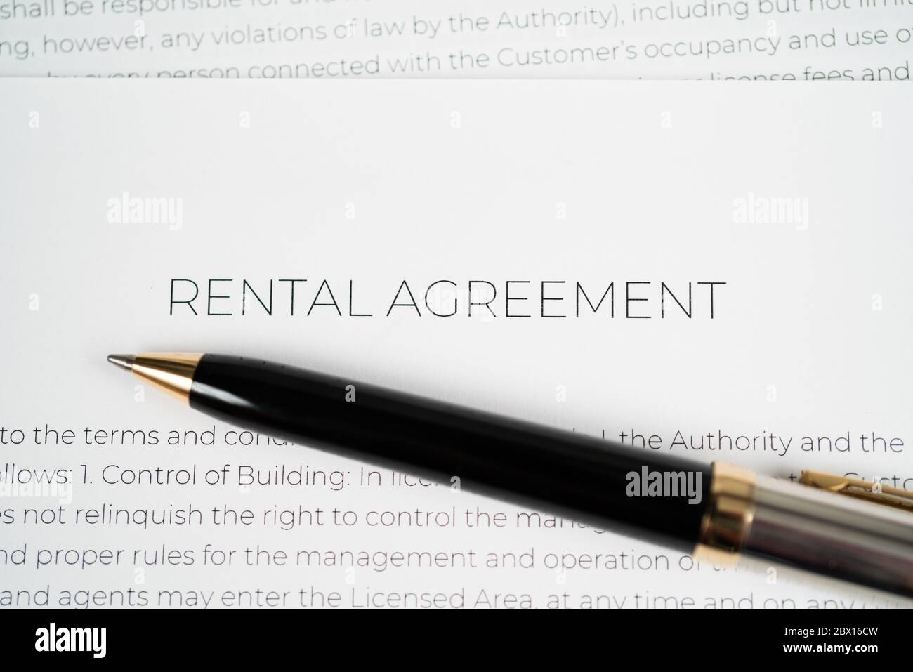 Pen on a rental agreement ready to be signed Stock Photo