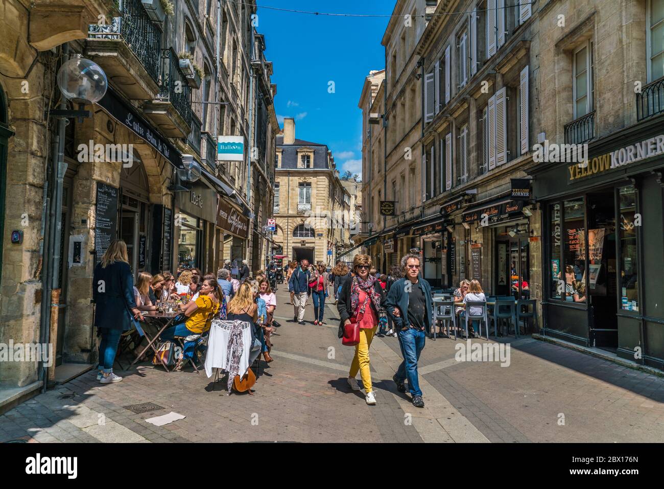 Bordeaux, France, 9 may 2018 - tourists and locals strawling, eating and drinking on the 'Rue de la Porte Dijeaux' Stock Photo
