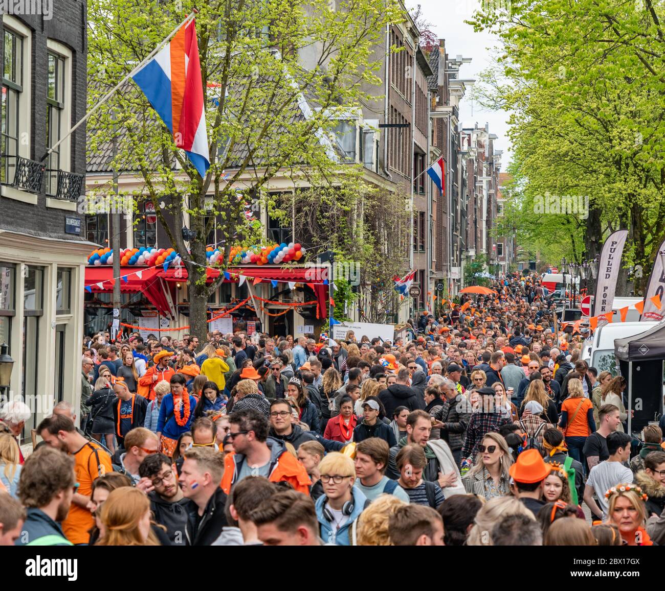 Amsterdam, The Netherlands, April 27 2018, Tourists and locals visiting the capital at the Prinsengracht to celebrate Kingsday Stock Photo