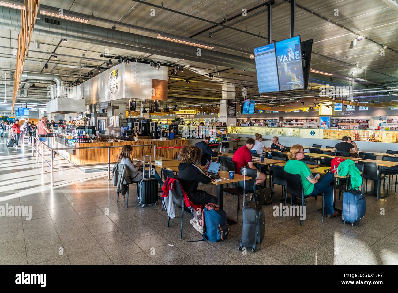 Eindhoven August 19th 2017: Interior of the terminal of Eindhoven Airport with passengers entering and leaving Stock Photo