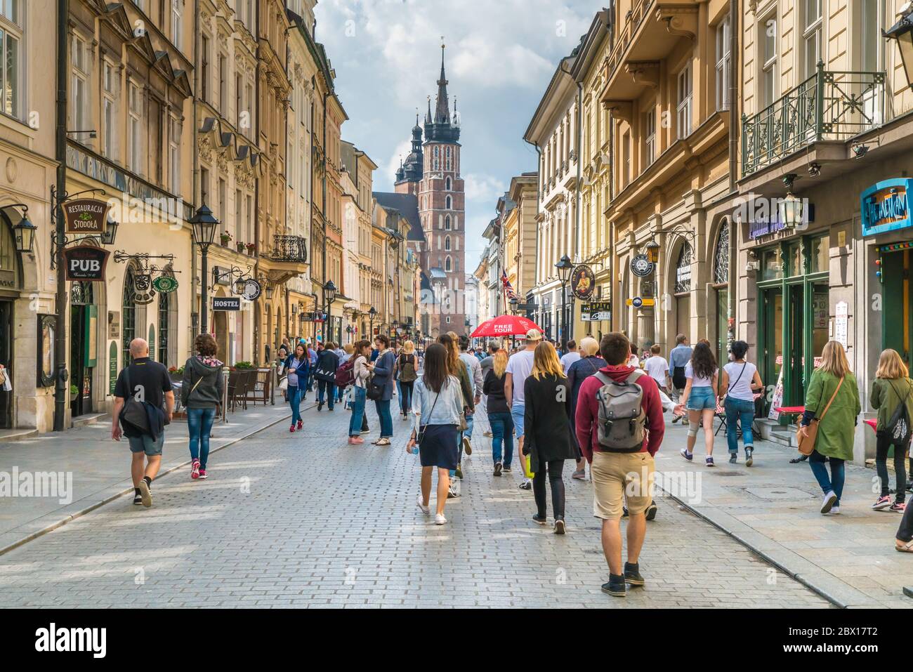 Krakau August 21st 2017: Tourists strawling on the Floriańska shopping street in the center of Krakow Stock Photo