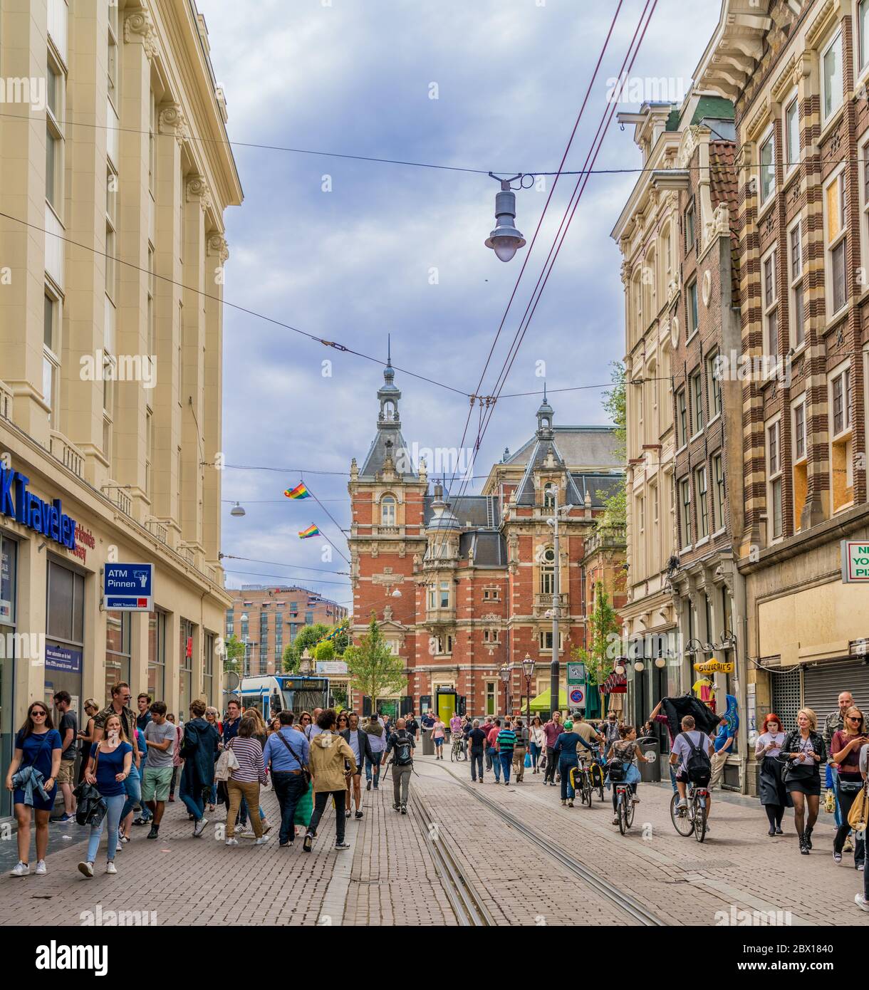 Amsterdam, The Netherlands, August 5 2017: Tourists and locals strawling on the Leidsestraat (Leidse-street) onto the Leidseplein (Leidse-square) Stock Photo