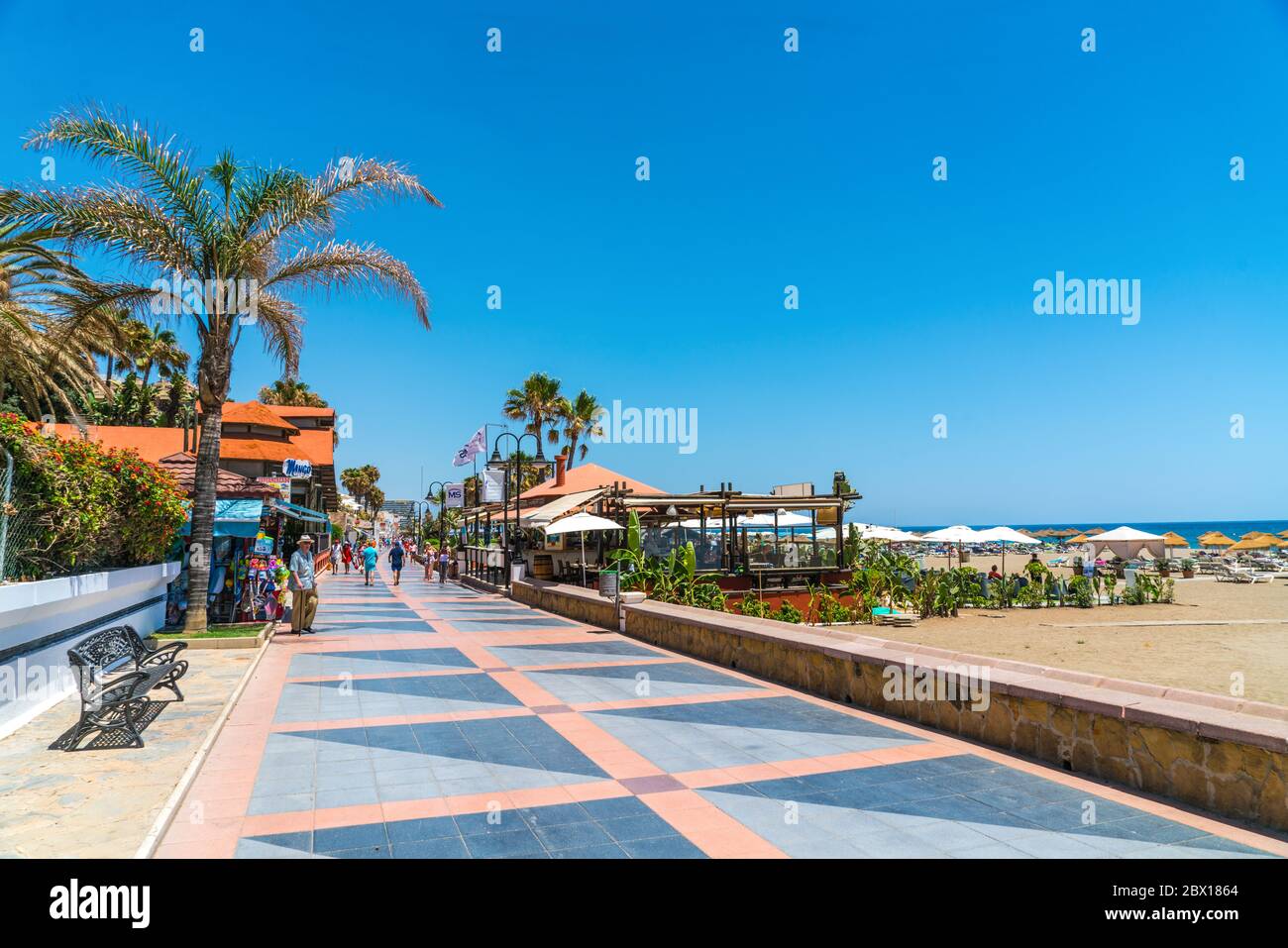 Benalmadena, Spain, june 27, 2017: Tourists strawling on the Benalmadena boulevard near Malaga Stock Photo