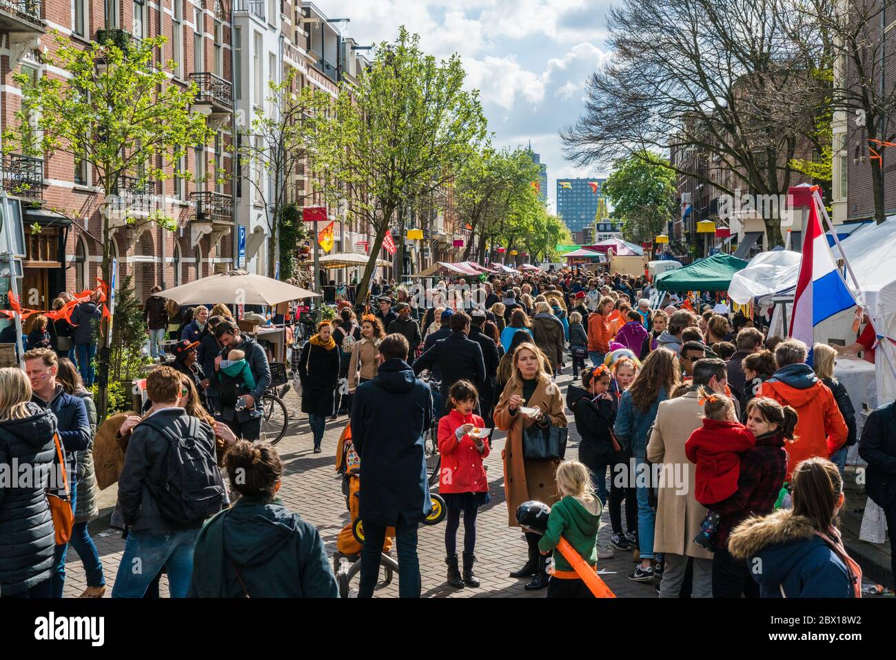 Amsterdam, The Netherlands, April 27 2017: Locals and tourists strawling on the free market of Kingsday in Amsterdam Stock Photo
