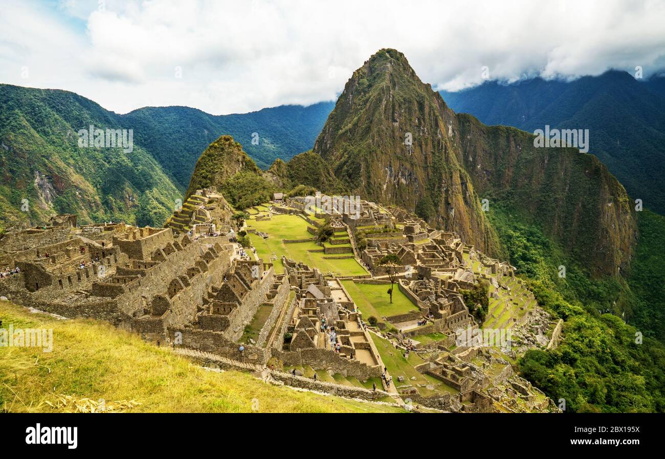 Machu Picchu in the Andes mountains of Peru Stock Photo - Alamy