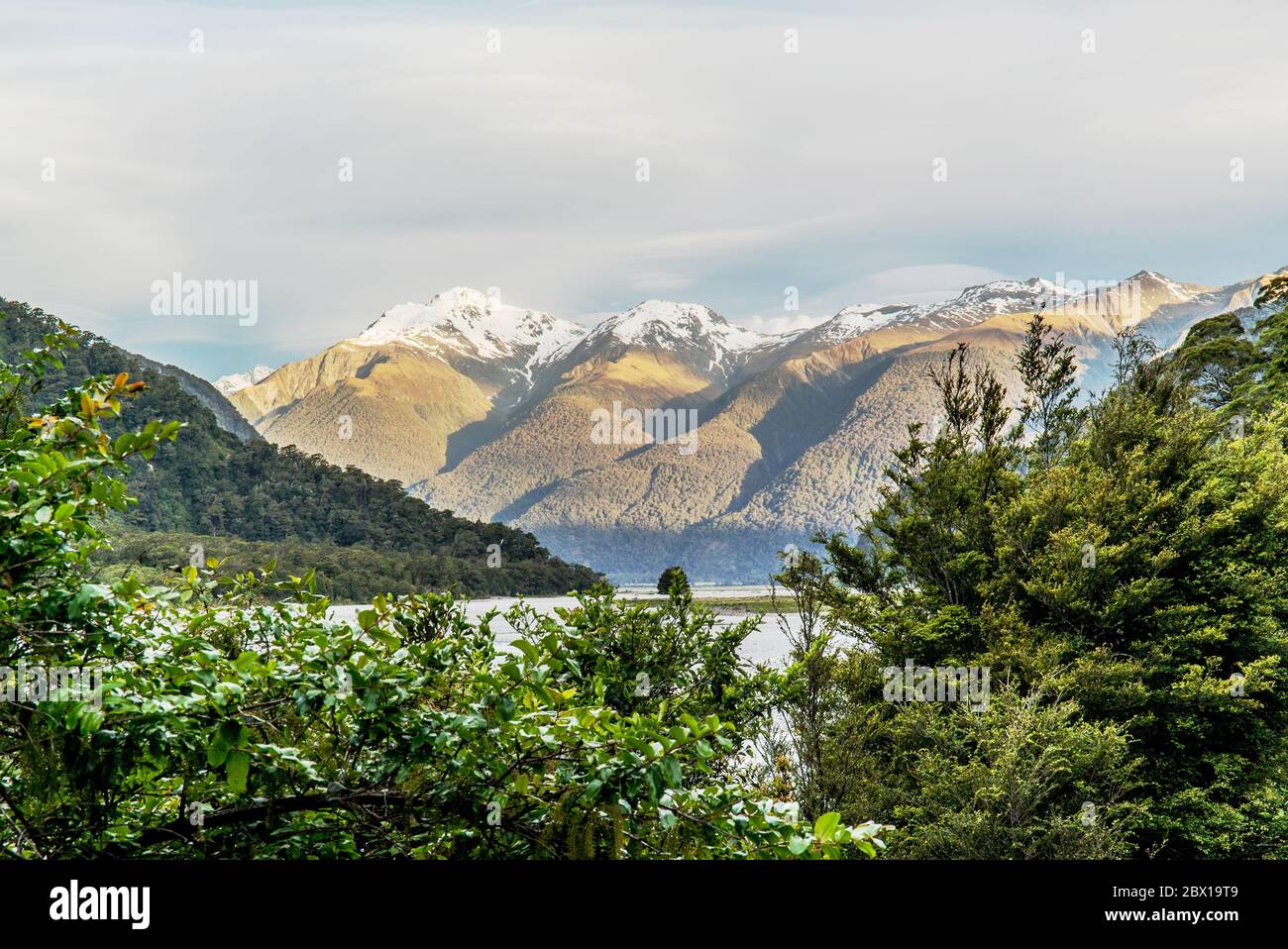 View over mountains with glaciers over the Hokitika lake on the south island of New Zealand Stock Photo