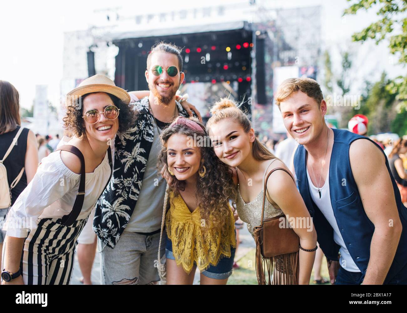 Group of young friends at summer festival. Stock Photo