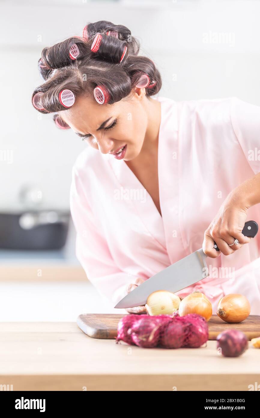 A woman cutting onion crying hi-res stock photography and images - Alamy