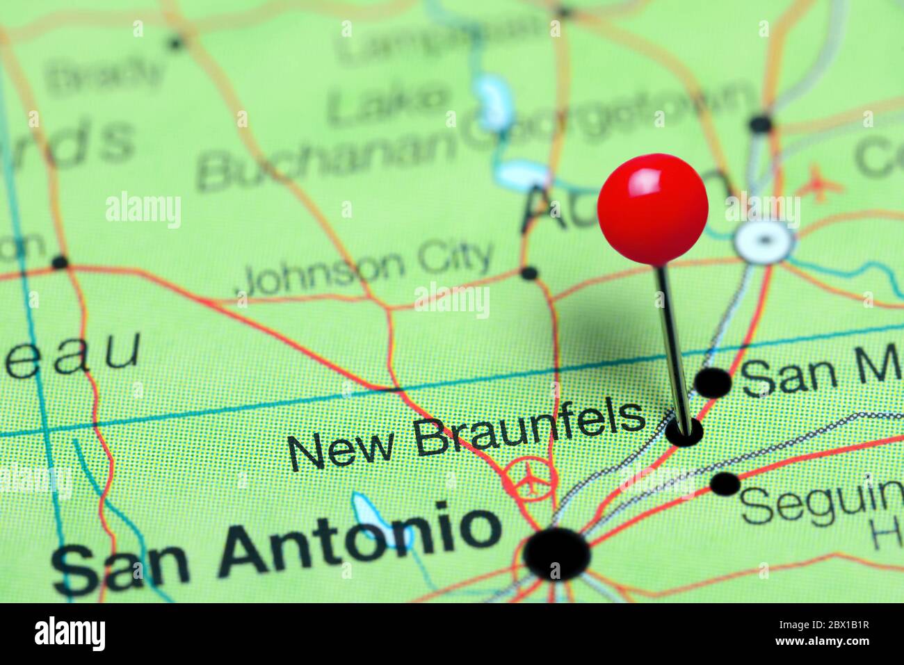 New Braunfels pinned on a map of Texas, USA Stock Photo
