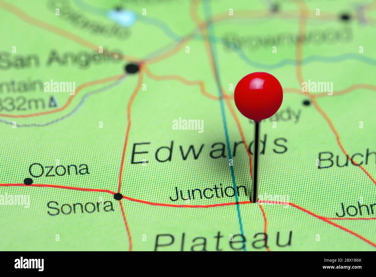 Junction pinned on a map of Texas, USA Stock Photo
