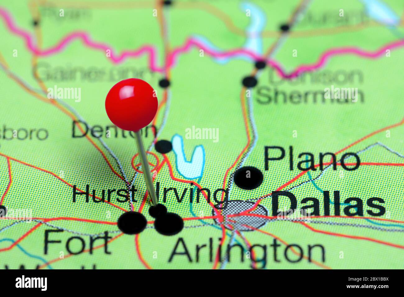Irving pinned on a map of Texas, USA Stock Photo