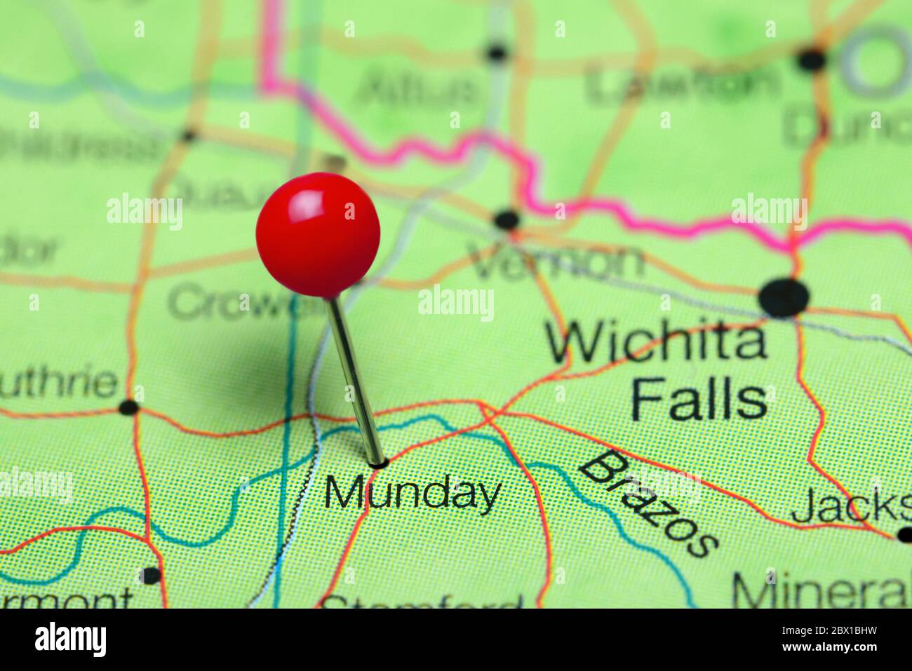 Munday pinned on a map of Texas, USA Stock Photo