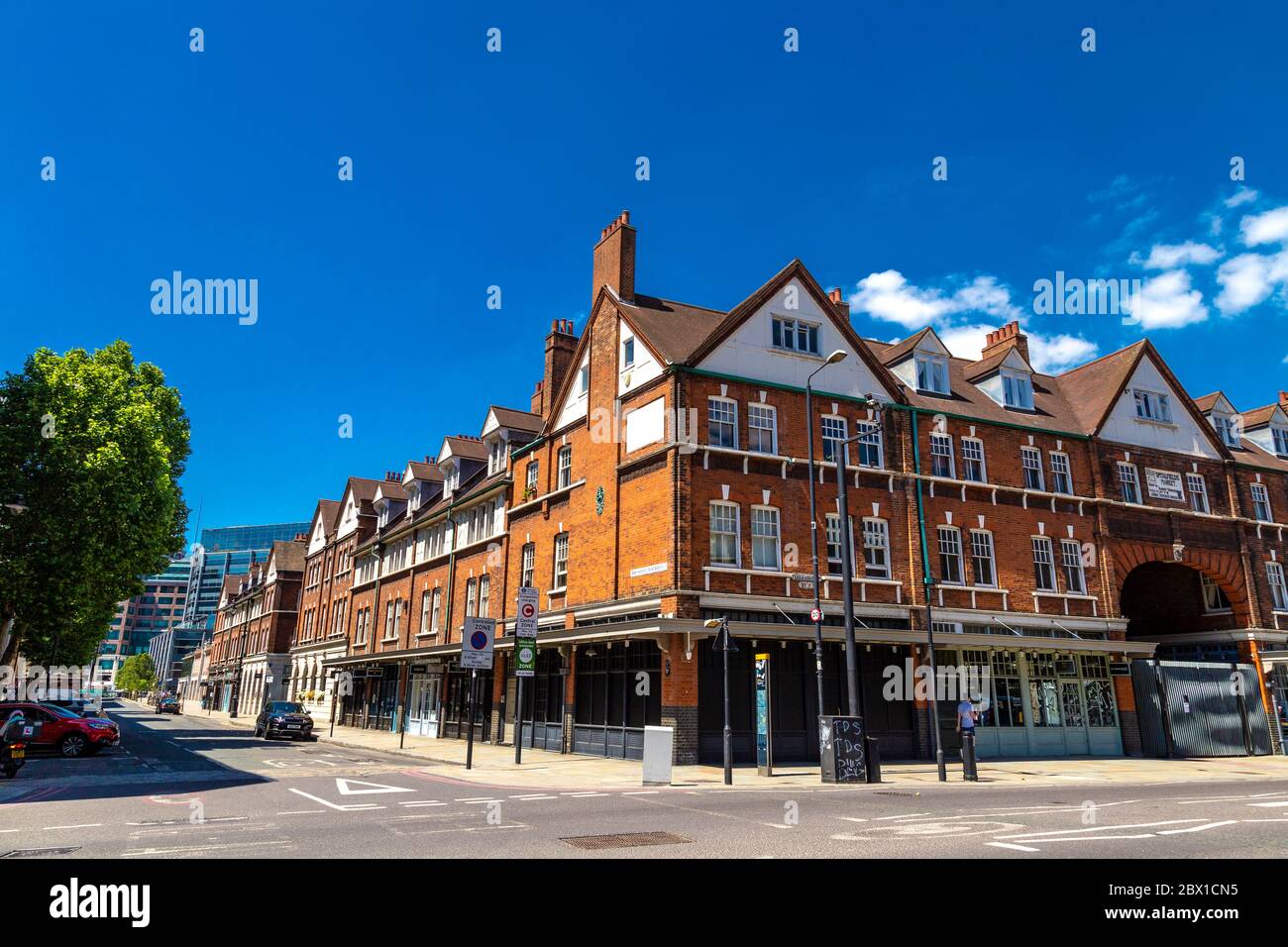 Exterior of Victorian era 19th century Old Spitalfields Market, with shops and boutiques, London, UK Stock Photo