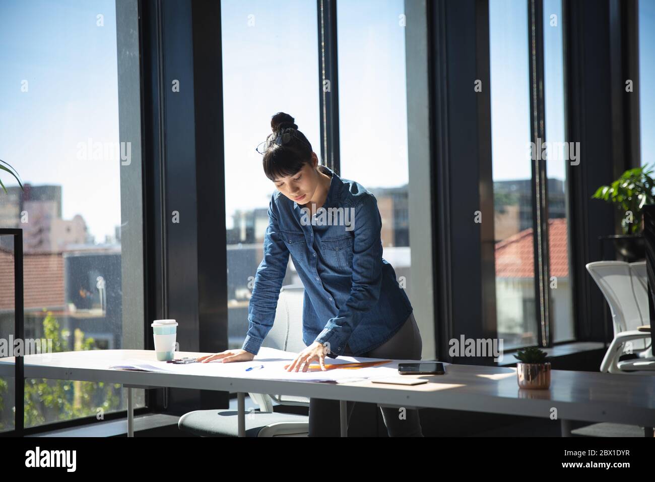 Asian Business Woman Working In Modern Office Stock Photo - Alamy